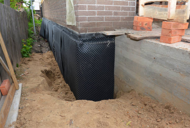 Happy homeowners after waterproofing job in King Ferry